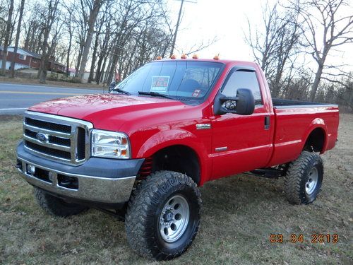 2006 ford f250 4x4 28k mi. diesel, 8" lift, 37" tires, like new very sharp truck