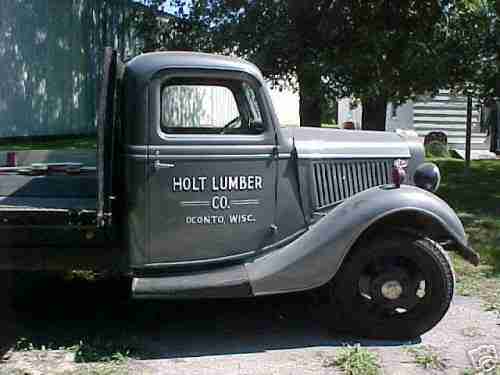 36 1 1/2 ton Ford flatbed stake truck, silver grey ,excellent original condition, image 3