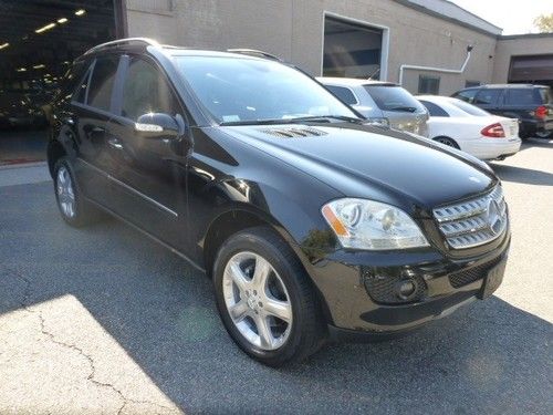 2006 mercedes benz ml350 awd,black/black leather/suede seats,19 wheels,88k mi