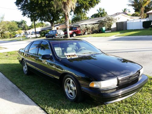 1996 impala ss sedan 4-door with new paint job.