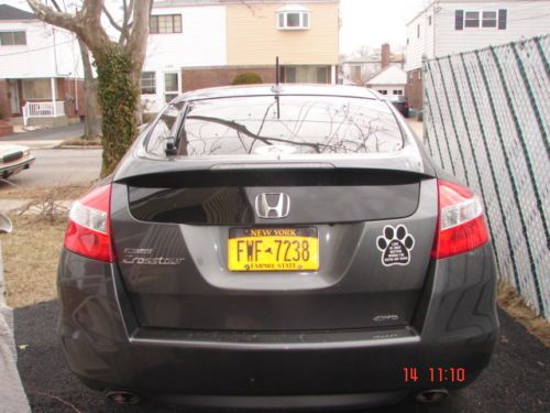 Dark grey low mileage honda accord crosstour - impecable condition.