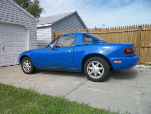 1992 mazda miata mx5 with a automatic transmission, and hardtop