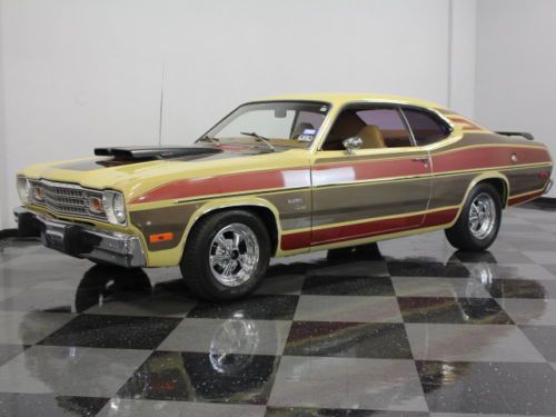 Built 340ci motor, very 70&#039;s paint scheme, dealer a/c, awesome running duster