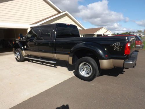 2011 f 450 crewcab lariat  two tone paint, black and tan,black leather interior.