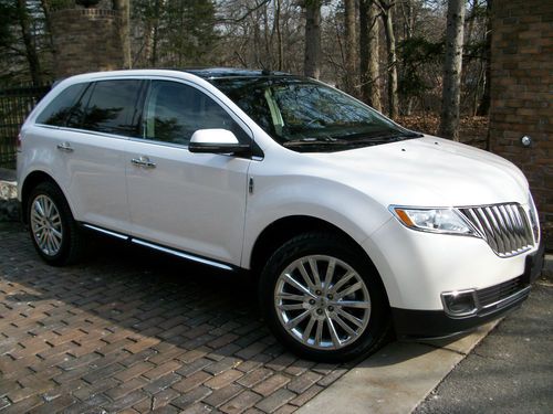 2012 mkx.no reserve.leather/navi/pano/20"chromes/blis/xenon/camera/ht/cl/rebuilt