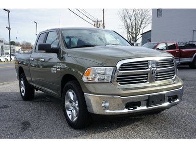 5.7l slt bighorn, 4x4 quadcab 8.4nav, backupcamera, antispin, heated seats/wheel