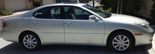 Low mileage 91k! single owner, non-smoker. great condition silver/grey color
