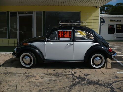 70  vw bug  classic. nicely restored. no trailer queen, she's a daily driver