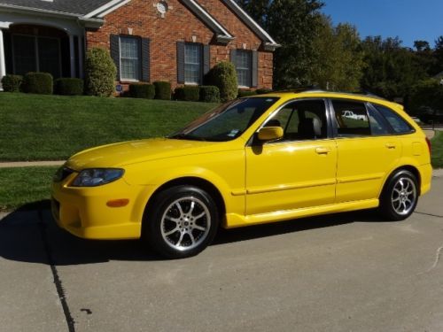 2002 mazda protege 5  vivid yellow   custom leather   5 speed     price reduced