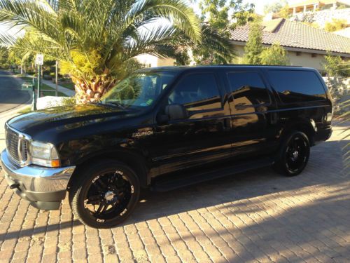 Executive suv limo conversion like becker not stretched custom  limousine bar tv
