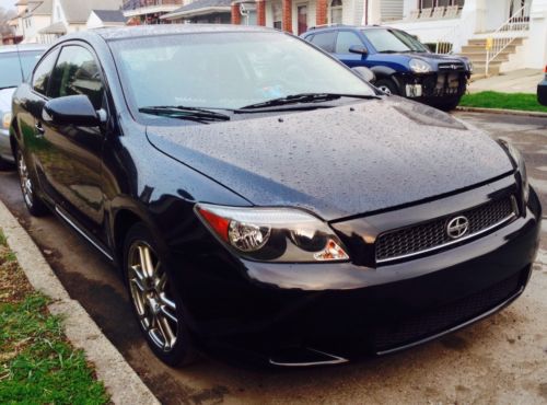 2005 scion tc, two door hatchback, manual, black inside/out