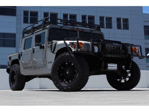 H1 4 man hard top::fuel hostage wheels::led&#039;s::leather::momo::roof rack::dvd