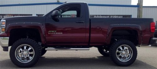 2014 chevrolet silverado 4x4 custom truck 6&#034; lift kit with custom paint.