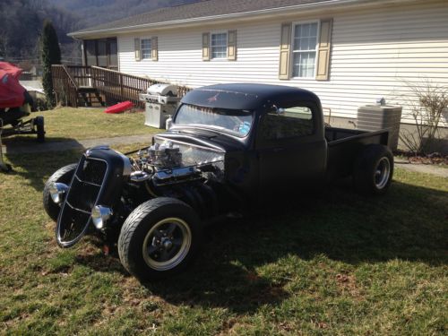 1952 ford rat rod truck. 440 dodge moter, flat black paint job. sharp!