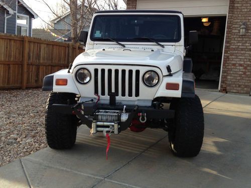 Jeep wrangler sport 4.0l 6 cyl, 5 sp,hardtop,lockers,heated leather, 33" tires