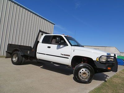 99 ram 2500 (3500 axle) cummins flat-bed 4x4 5spd sky-jackers aloca lift texas !