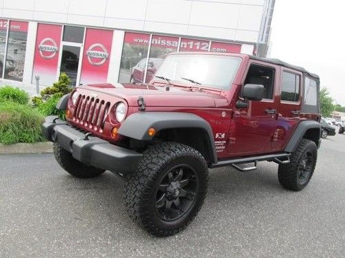 2009 jeep wrangler unlimited x 4wd turbo charged + $20k in upgrades! we finance
