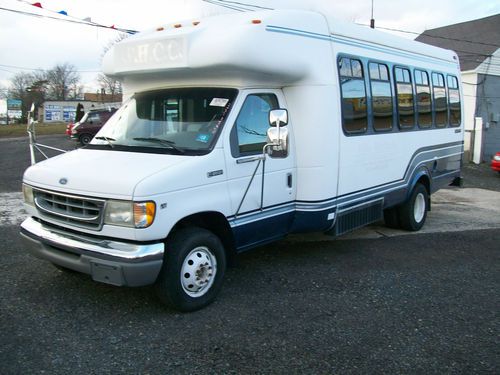 1997 e 350 sd 14 passenger and a wheel chair lift with low milage