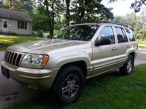 1999 jeep grand cherokee limited loaded with leather awd super clean