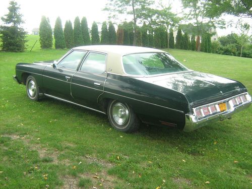 Green chevy Impala