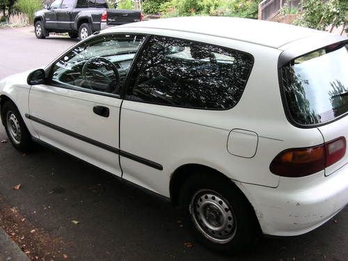 white, hatchback, 175k miles, good mpg, a/c, radio, tape deck, new tires,1992, image 2