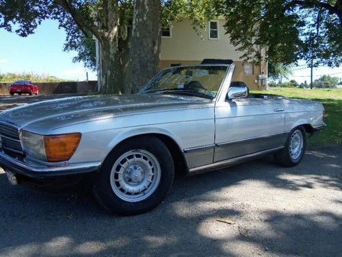 1983 mercedes convertible 500sl  automatic  silver  clean and runs great