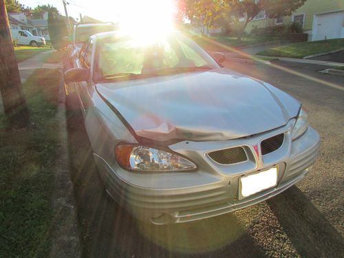 2002 pontiac grand am se 96,000 miles hood damage