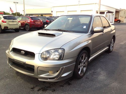 Clean subaru wrx runs strong looks good rebuilt title export ok upgrades