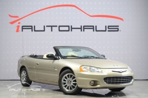 Very low miles one owner power convertible 6 disc changer