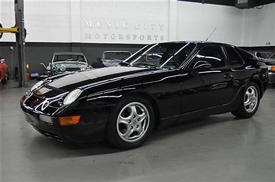 Strooooong driving black black 968 coupe 6 speed