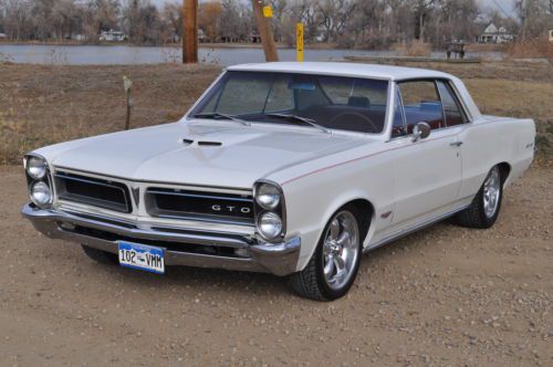 1965 pontiac gto 389 tri power 4 speed.