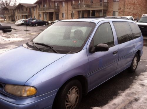 Light blue 3 door mini van