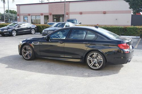 2013 bmw m5 black like new with only 2208 miles