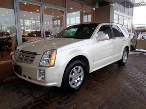 White, 2008 cadillac srx. awd, sunroof, leather seats, third row seating, etc