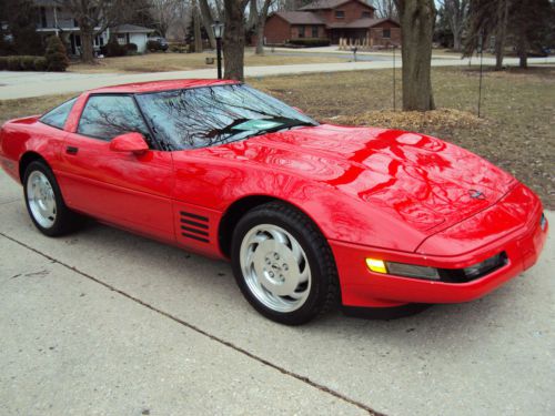 Gorgeous 1994 ( red on red 6spd)  corvette coupe, absolutely babied
