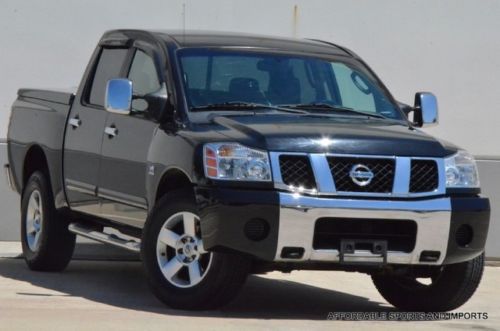 2004 nissan titan 4wd crew 5.6l v8 s/bed cloth seats $699 ship