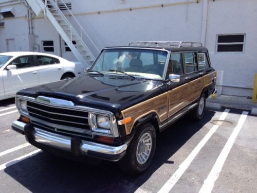 1990 jeep grand vagoneer black with tan very clean