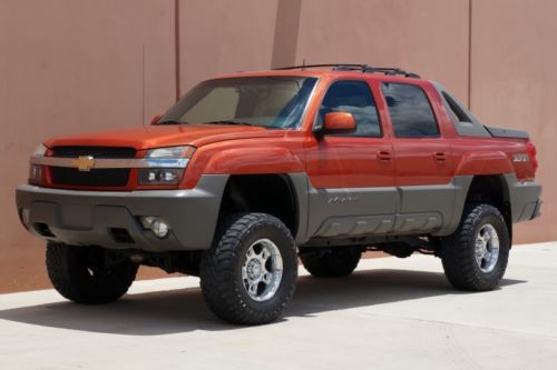 02 chevy avalanche z71 4x4 lifted chrome wheels leather mroof cd heated sts!!!!!