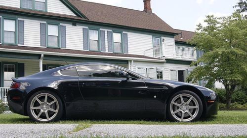 *modified 16k mi 2007 aston martin vantage v8 6 spd black/black &amp; red leather