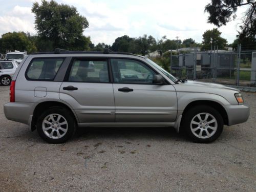 2005  subaru forester  salvage title light damage  ,