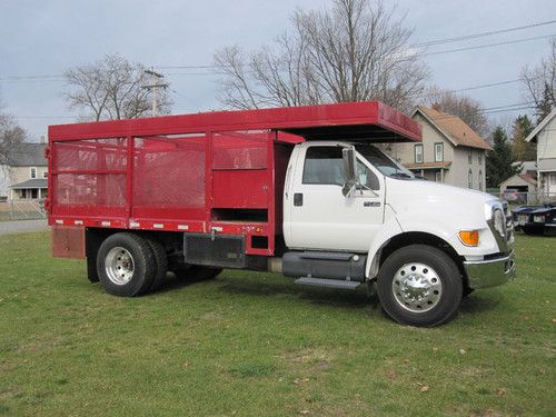 2006 ford f750 f650 reg cab w/ stake rack type box cummins diesel only 26k