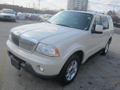 Luxury suv 4.6l diamond white tan leather 3rd row seat awd