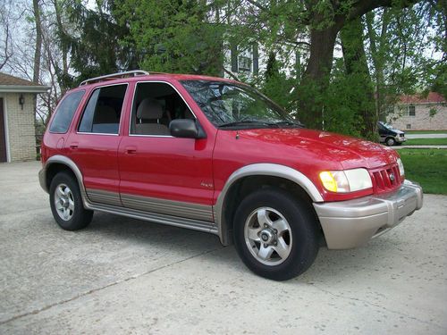 2002 kia sportage 4x4 4dr suv / 4 cylinder/2.0l /automatic / very sharp