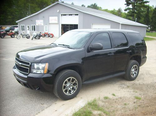 Black tahoe 4x4 ssv ex police/ custom rims