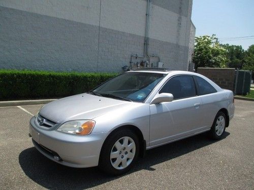 Low miles moonroof 2 door cpe 4 cyl front wheel drive automatic
