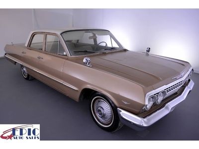 63 chevy bel air - belair - clean gold tan cloth manual 4 door rwd  we finance