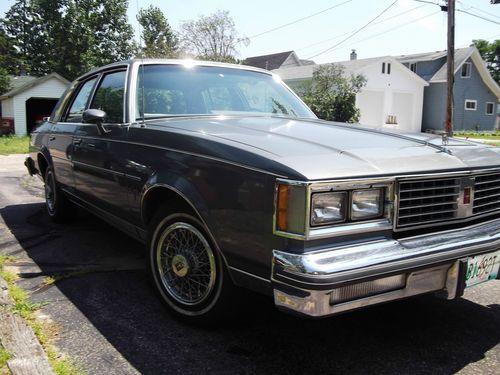 1987 oldsmobile cutlass supreme brougham sedan 4-door 5.0l