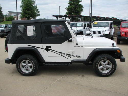 2001 jeep wrangler se 2.5l 4 cylinder auto soft top half doors will take trades!