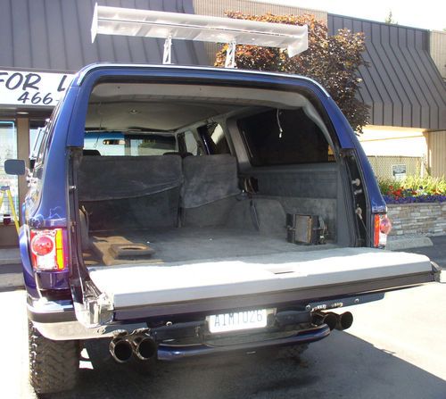 1986 AIR BRUSHED PEARL BLUE SUBURBAN REBORN AS A LIFTED CUSTOM HOT ROD TRUCK, image 12