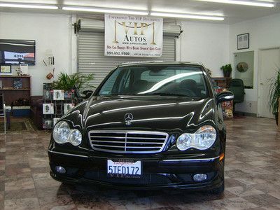 4 four door black leather interior moon roof black exterior custom wheels